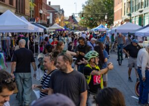 People at Open Streets Lowell with tents